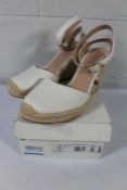A pair of women's as new Stuart Weitzman Crystal Buckle Canvas Espadrille Wedge Sandals (41.5).