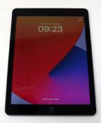A pre-owned Apple iPad 9.7