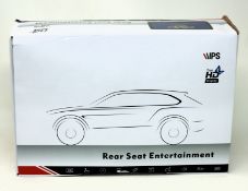A boxed as new Rear Car Seat Media Player.