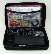 An as new Specialized E-Bike Battery Charger (M/N: SBC-C04) with storage case.