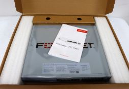 A boxed as new Fortinet FortiSwitch 124E-FPOE Secure Access Switch (P/N: P21391-01-01 EU) (Box opene