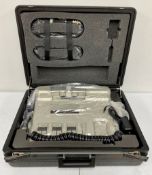 A pre-owned SMC Pneumatics Advanced Spinal Mobilization Instrument (ASMI) Machine in custom foam lin