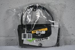 An as new Longchamp Le Pliage Bag in Green.