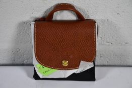 An as new Longchamp Le Pliage Original Backpack, Black/Brown.