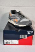 A pair of men's boxed Reebok LX8500 running trainers Purgry/Pugry3/Vincha (Size UK 11).