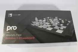 A boxed as new Square Off Pro Rollable E-Chessboard (M/N: PRO-INFI A1030 EAN: 850009237057) (Box sea