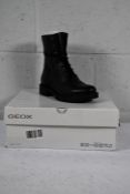 A pair of boxed Geox black D Hoara ankle lace up boots (Size 5.5).