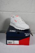 A pair of women's boxed Reebok Glide running trainers FTWWHT/PNKGLW/CHERRY (Size UK 6.5).
