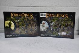 Two as new The Lord of The Rings Middle-Earth Strategy Battle Game products to include 1x Minas Tiri