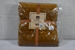 An as new Halo Quilted Soft Luxury Throw in Antique Gold - 140 x 240cm (3CT1223A).