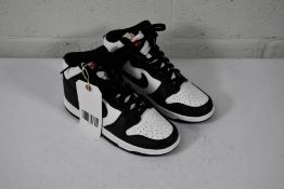 A pair of women's Nike Dunk High Trainers in White and Black, Size UK 6 (Good Condition, No box/tags