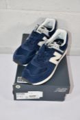 A pair of boxed as new New Balance 574 Trainers - Blue (UK 11).