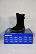 A pair of as new Birkenstock Uppsala Shearling Boots in Black, Size UK 5.5.