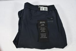 A pair of as new Hugo Boss T-Flex Chinos, Easy Iron Stretch Fabric, Size 50.