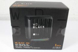 A boxed as new WD_ Black 1TB D50 Game Dock 3000MB/s NVMe Gaming SSD (EAN: 718037876405) (Box sealed)