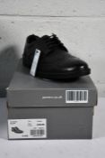 A pair of men's boxed Pavers Black Brogue style shoes (Size UK 8 (42)).