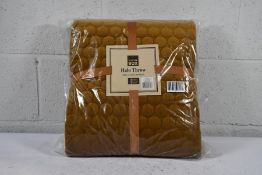 An as new Halo Quilted Soft Luxury Throw in Antique Gold - 140 x 240cm (3CT1223A).