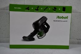 A boxed as new iRobot Handheld Vacuum H1.