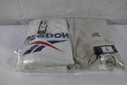 Four as new Reebok Crewneck Sweaters (Sizes 1x S, 2x L and 1x XL).
