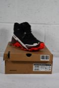 A pair of as new Salomon Cross Hike Mid GTX 2 in Black/Bitter Chocolate/Fiery Red, Size UK 8.5.