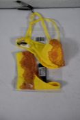 An as new Andres Sarda Eden Rock Push-Up Bra with Removable Pads in Blazing Yellow, Size UK 32 and a