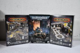 Four as new Warhammer products to include 2x Astra Militarium Leman Russ Battle Tanks, 1x Necromunda