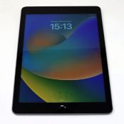 A pre-owned Apple iPad 9.7