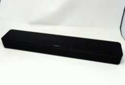 A pre-owned Bose TV Speaker (M/N: 431974) (Repaired- paperwork included. Boxed, power cable included