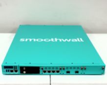A Smoothwall CAR-6010 Network Appliance (Appears as new, boxed with network cables and keys. Box ope