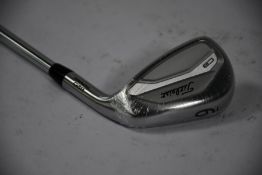 A Titleist 9 Iron 620 Forged golf club.