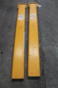A pair of 5ft forklift fork extensions.