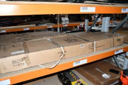 A HOMCOM Exercise Pulley Machine Power Tower with Adjustable Seat Cable Positions.