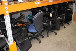 A large quantity of office clearance computer chairs in assorted styles and colours