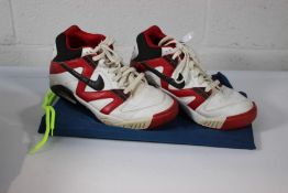 A pair of pre-owned Nike Air Tech Challenge in White/Varsity Red, Size 8, viewing advised.