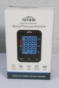 Forty boxed as new Simbr Blood Pressure monitors (Upper Arm Electronic).