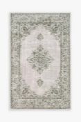 An as new Louis De Poortere Starfield Rug, Green (230 x 330cm, Stock Photo).