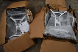 Two pre-owned Pe Pe Mobility Swivel Bath Chairs, boxes damaged and may be incomplete.