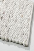 An as new Perletta Limone 100% pure New Zealand wool rug 250 x 400 (332 cement) Stock photo.