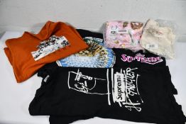 Eight pre-owned Supreme T-Shirts in assorted designs and sizes.