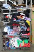 A large quantity of assorted pre-owned clothing and related.