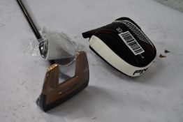 An as new Ping Hepler Tyne 3 left handed putter.