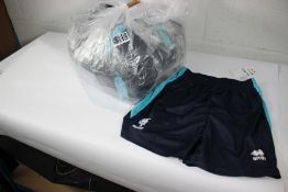 Thirty pairs of as new junior Lincoln City football shorts.