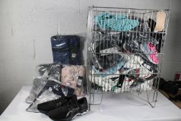 Approximately sixty items of miscellaneous as new sportswear to include Adidas, Rogue and Reebok.
