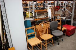 A large quantity of miscellaneous furniture to include chairs, dresser and lockable storage unit.