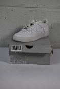A pair of Nike Air Force 1 LE (GS) Trainers in White/White, Size UK 4, Slight marks on shoes.
