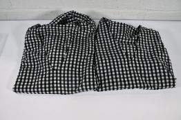 Two Ganni black/white check Seersucker puff sleeve V-neck overhead blouses (Size 1 x 42 1 x 44).