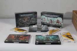 Three packs of Warhammer 40,000 index cards to include Space Wolves, Adepta Sororitas, World Eaters,