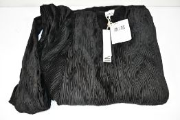 An as new Ganni black pleated puff short sleeve blouse (Size 42).