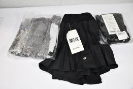 A Lululemon grey/black Pace Rival Skirt Tall (Size 10) and two black Lululemon side pleat HR Tennis