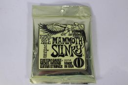 Ten packs of Ernie Ball 2214 Mammoth Slinky Electric Guitar Strings (12-62).